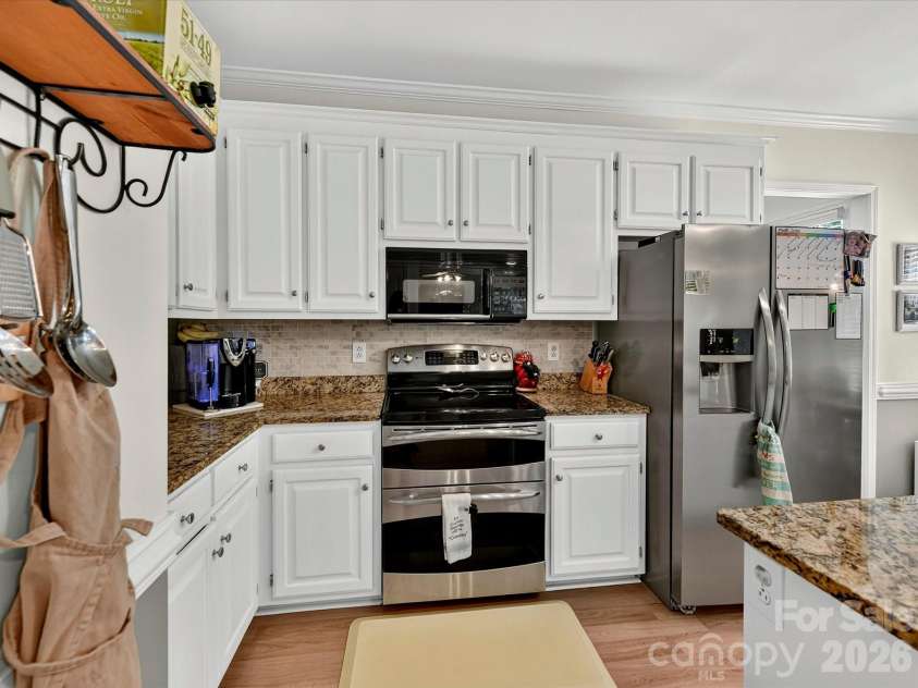 4411 Poplar Grove Drive, Charlotte, NC 28269.  MLS# CAR4396983, YatesRealty ID 33034. 