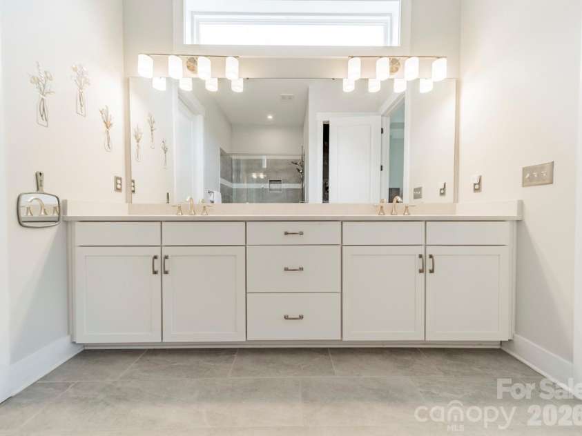 1019 Carlyle Lane, Monroe, NC 28110.  MLS# CAR4395898, YatesRealty ID 33040. Bright Primary Bathroom