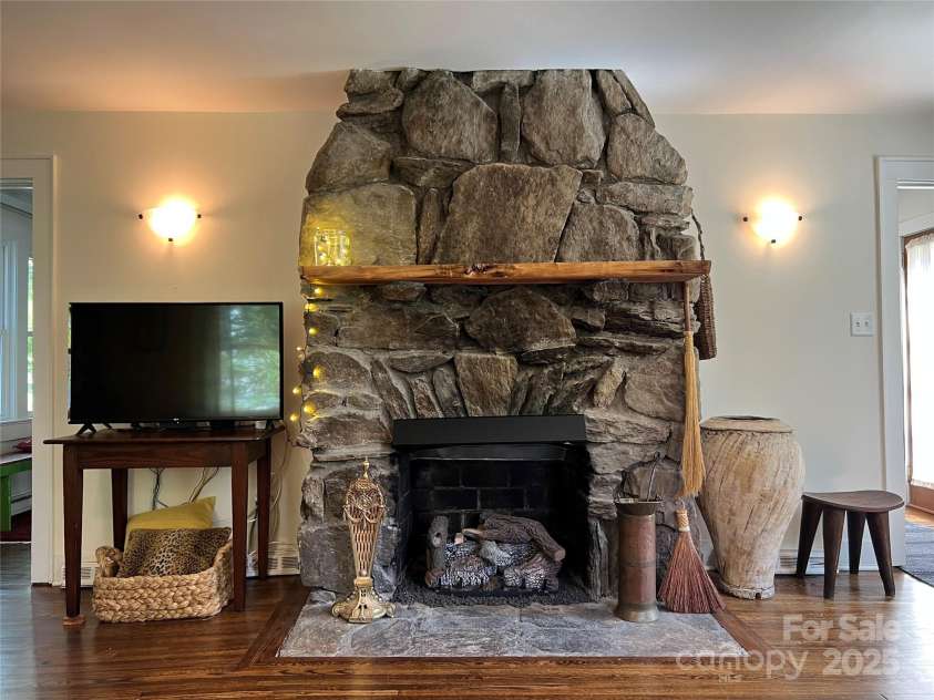 6 Craggy Circle, Asheville, NC 28803.  MLS# CAR4257989, YatesRealty ID 33040. Amazing stone gas fireplace