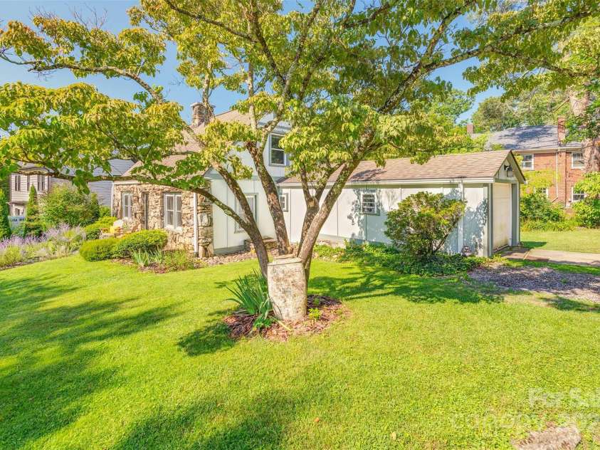 6 Craggy Circle, Asheville, NC 28803.  MLS# CAR4257989, YatesRealty ID 33040. Mature trees