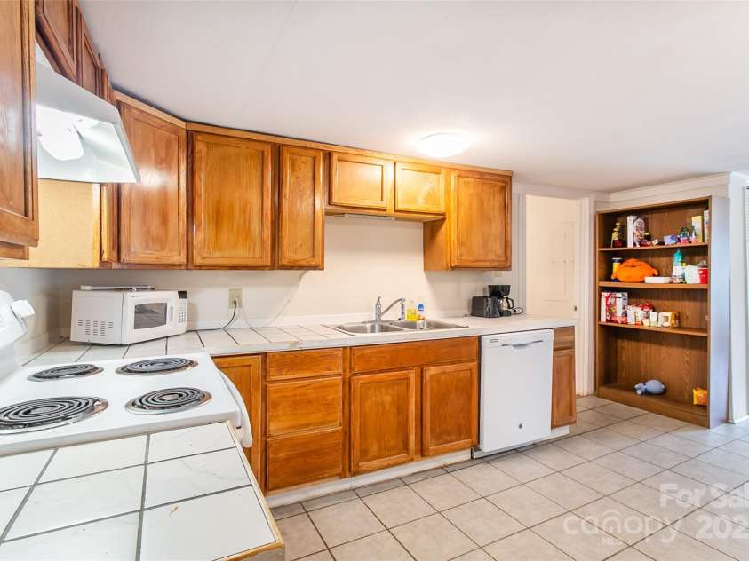 27 Curlee Street, Brevard, NC 28712.  MLS# CAR4284053, YatesRealty ID 33045. 