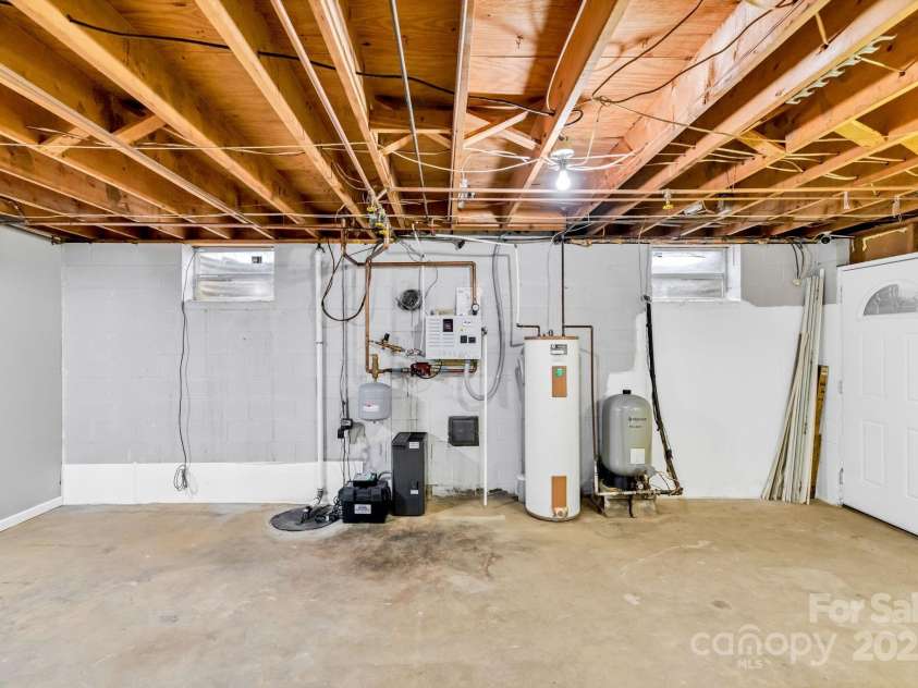 1277 Park Vista Road, West Jefferson, NC 28694.  MLS# CAR4290622, YatesRealty ID 33046. Basement Storage