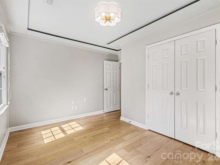 4600 Bournewood Lane, Charlotte, NC 28226.  MLS# CAR4355156, YatesRealty ID 33047. Upper secondary bedroom 4 on right front