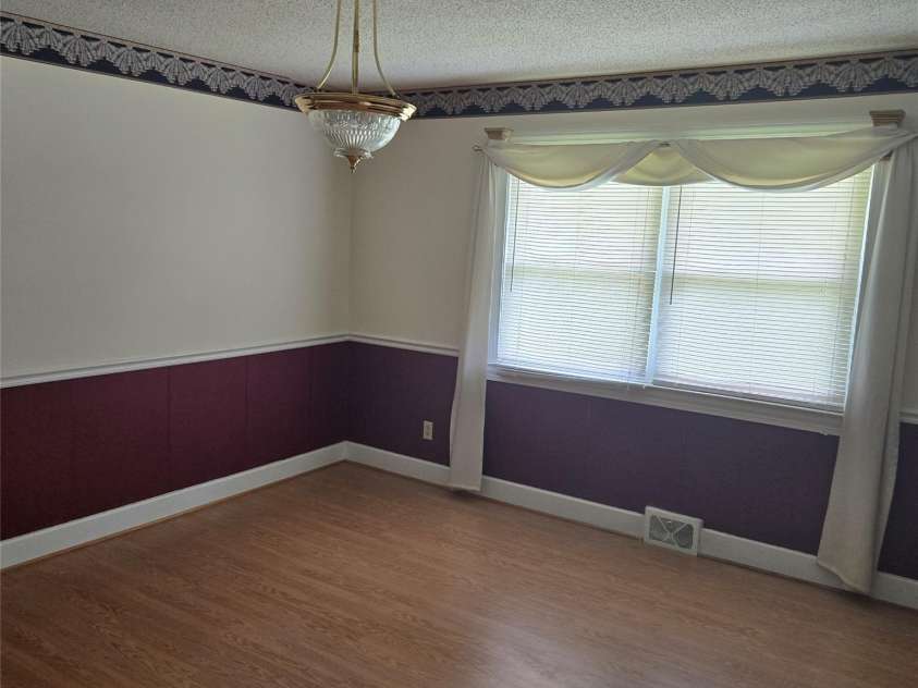 115 Cherry Blossom Lane, Stony Point, NC 28678.  MLS# CAR4292262, YatesRealty ID 33048. Dining Rm