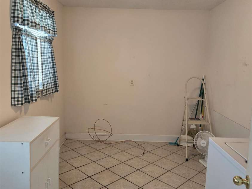 115 Cherry Blossom Lane, Stony Point, NC 28678.  MLS# CAR4292262, YatesRealty ID 33048. Laundry Rm