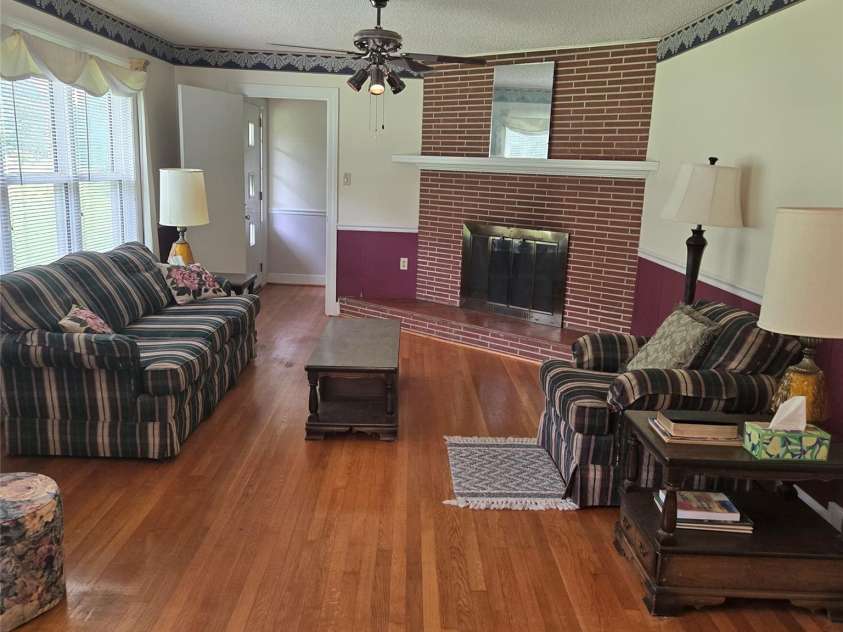 115 Cherry Blossom Lane, Stony Point, NC 28678.  MLS# CAR4292262, YatesRealty ID 33048. Living Rm