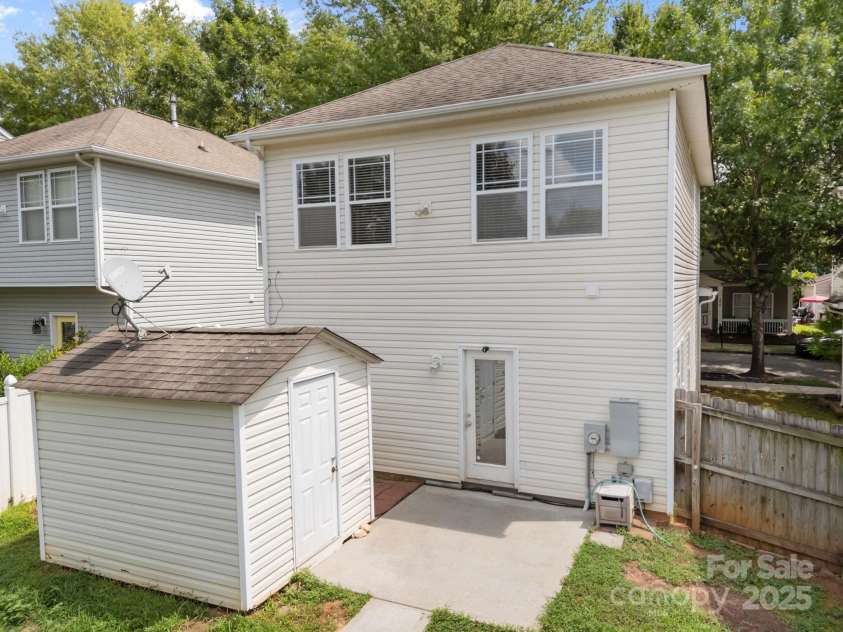 12313 Walden Lea Drive, Huntersville, NC 28078.  MLS# CAR4291322, YatesRealty ID 33056. Back yard with Shed and patio
