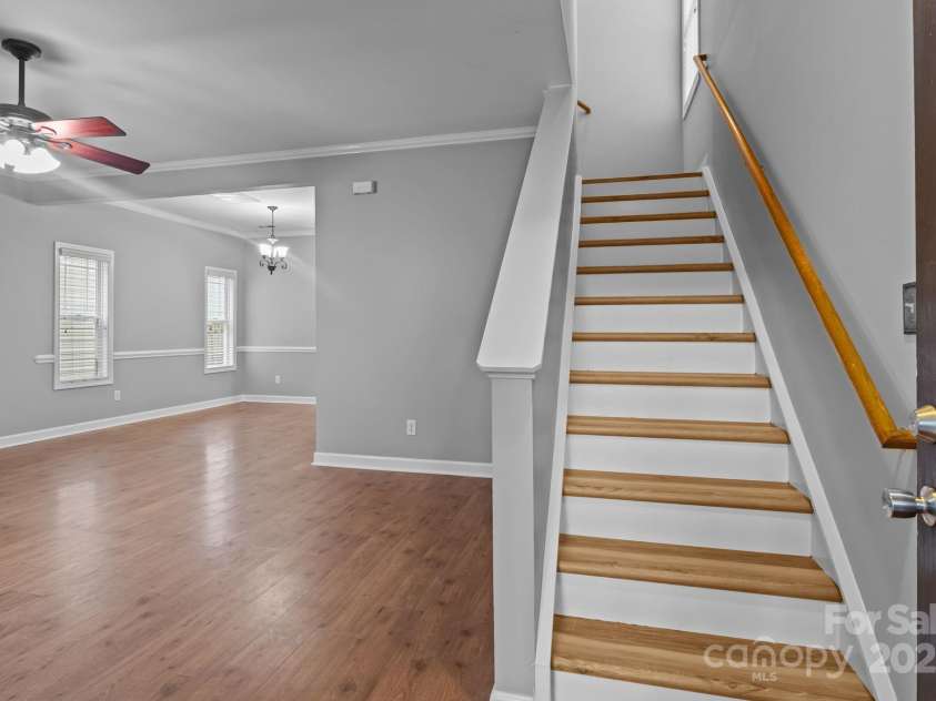 12313 Walden Lea Drive, Huntersville, NC 28078.  MLS# CAR4291322, YatesRealty ID 33056. Front entrance and lvp stairs