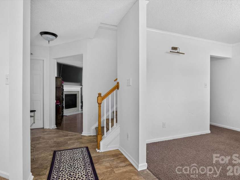9833 Aventide Lane, Charlotte, NC 28215.  MLS# CAR4377310, YatesRealty ID 33061. Entryway leading to interior of home
