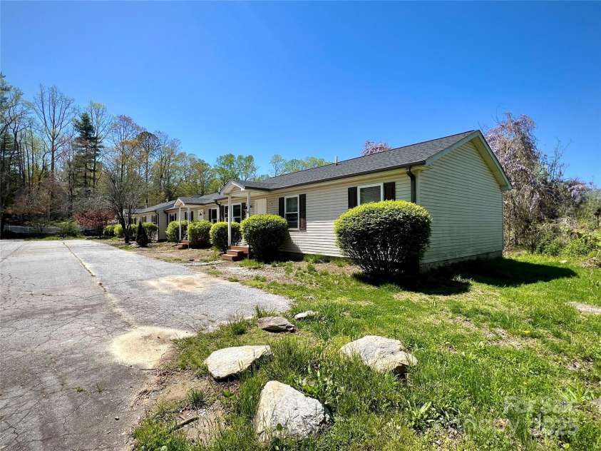 1754 Meadowbrook Terrace, Hendersonville, NC 28791.  MLS# CAR4269491, YatesRealty ID 33067. Ample parking for all 4 units.