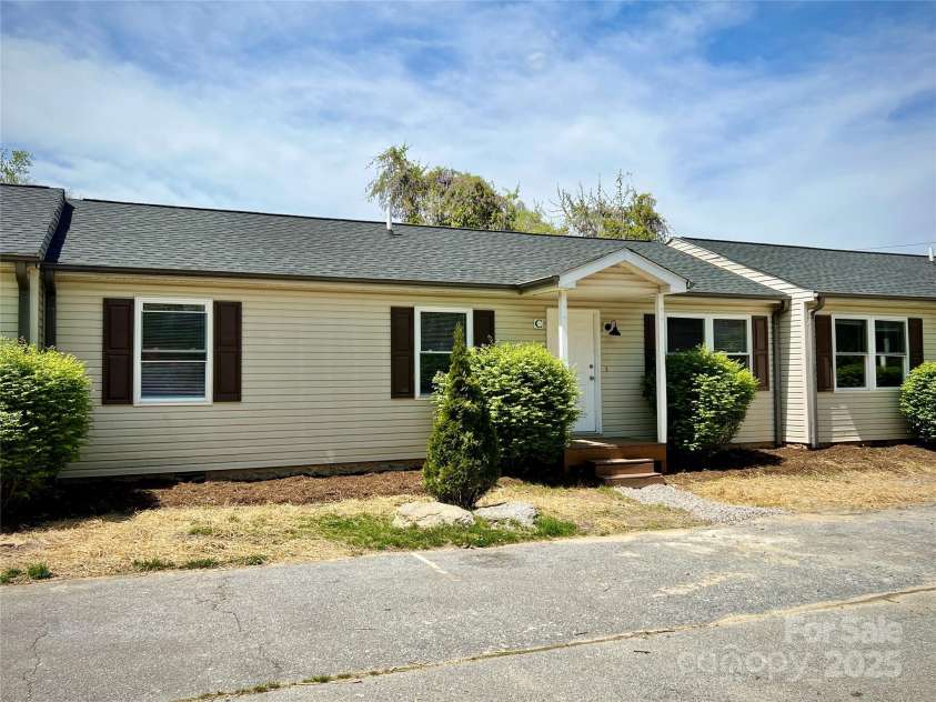 1754 Meadowbrook Terrace, Hendersonville, NC 28791.  MLS# CAR4269491, YatesRealty ID 33067. Exterior of Unit C.