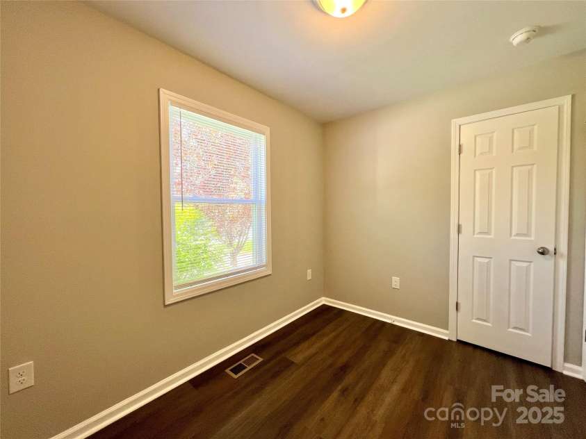 1754 Meadowbrook Terrace, Hendersonville, NC 28791.  MLS# CAR4269491, YatesRealty ID 33067. Typical bedroom.