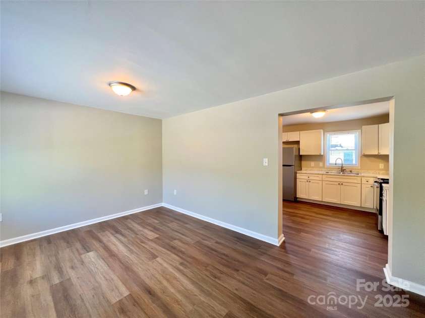 1754 Meadowbrook Terrace, Hendersonville, NC 28791.  MLS# CAR4269491, YatesRealty ID 33067. Typical living room.