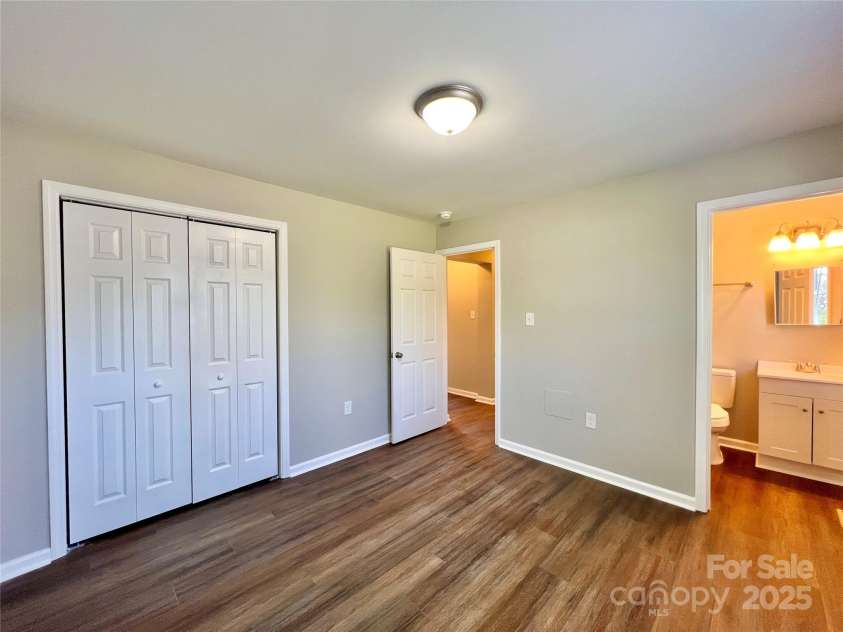1754 Meadowbrook Terrace, Hendersonville, NC 28791.  MLS# CAR4269491, YatesRealty ID 33067. Typical primary bedroom.