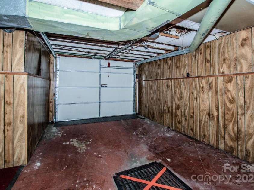 1302 A Street, Kannapolis, NC 28081.  MLS# CAR4291773, YatesRealty ID 33072. Basement Garage