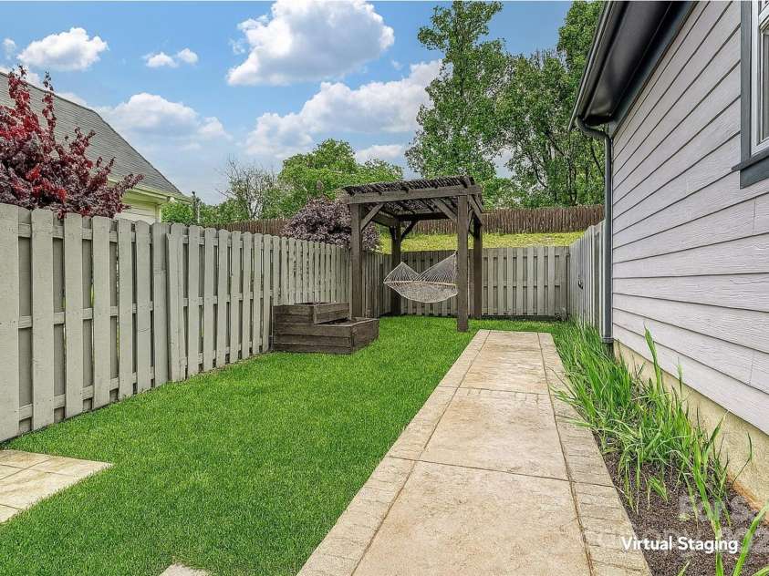 817 Digby Road, Rock Hill, SC 29730.  MLS# CAR4220717, YatesRealty ID 33076. Virtual staging with grass in back yard