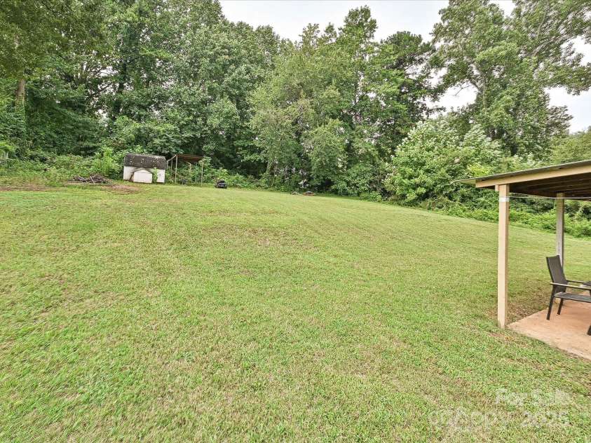 2283 Hillside Drive, Newton, NC 28658.  MLS# CAR4289056, YatesRealty ID 33077. Back yard