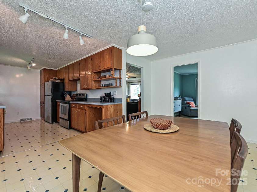 2283 Hillside Drive, Newton, NC 28658.  MLS# CAR4289056, YatesRealty ID 33077. Dining Area/ Kitchen