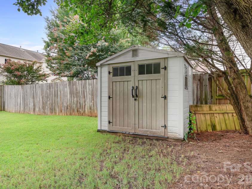 403 Lafinca Court, Fort Mill, SC 29708.  MLS# CAR4393703, YatesRealty ID 33077. Extra storage building included with the home