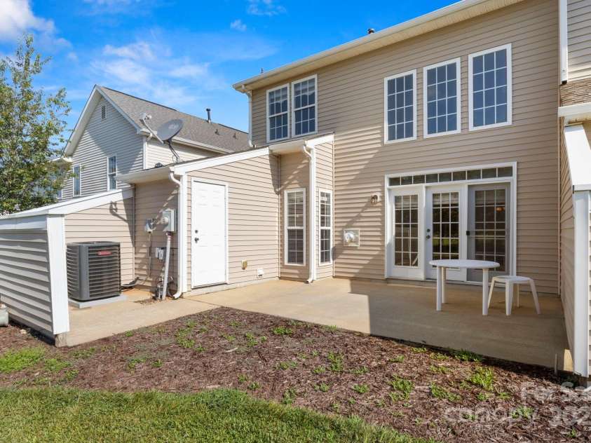 6318 Rhodins Lane, Fort Mill, SC 29707.  MLS# CAR4281464, YatesRealty ID 33078. Back Patio