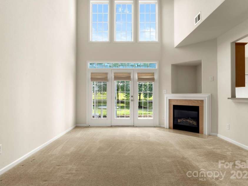 6318 Rhodins Lane, Fort Mill, SC 29707.  MLS# CAR4281464, YatesRealty ID 33078. Living Rm - lots of light!