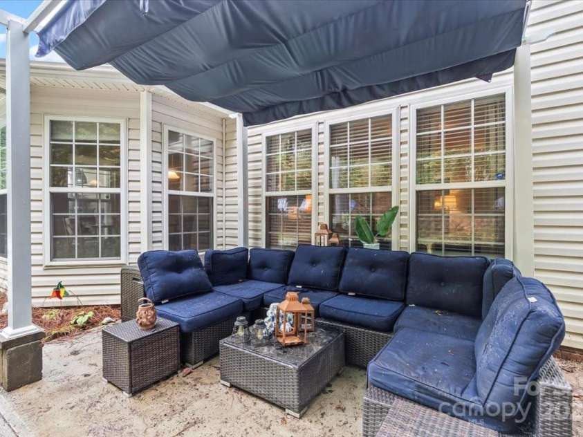 131 Misty Arbor Lane, Mooresville, NC 28117.  MLS# CAR4291444, YatesRealty ID 33085. Covered Patio