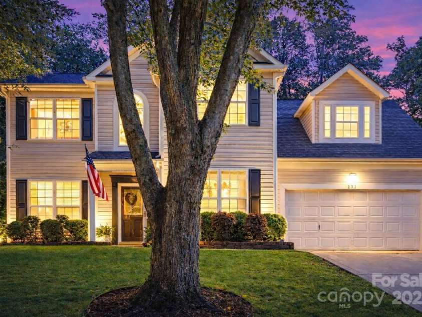 131 Misty Arbor Lane, Mooresville, NC 28117.  MLS# CAR4333134, YatesRealty ID 33085. Front exterior at dusk. *Photo has been virtually enhanced.*