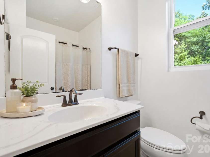 1613 Calder Drive, Indian Trail, NC 28079.  MLS# CAR4397830, YatesRealty ID 33088. Main level ensuite bath