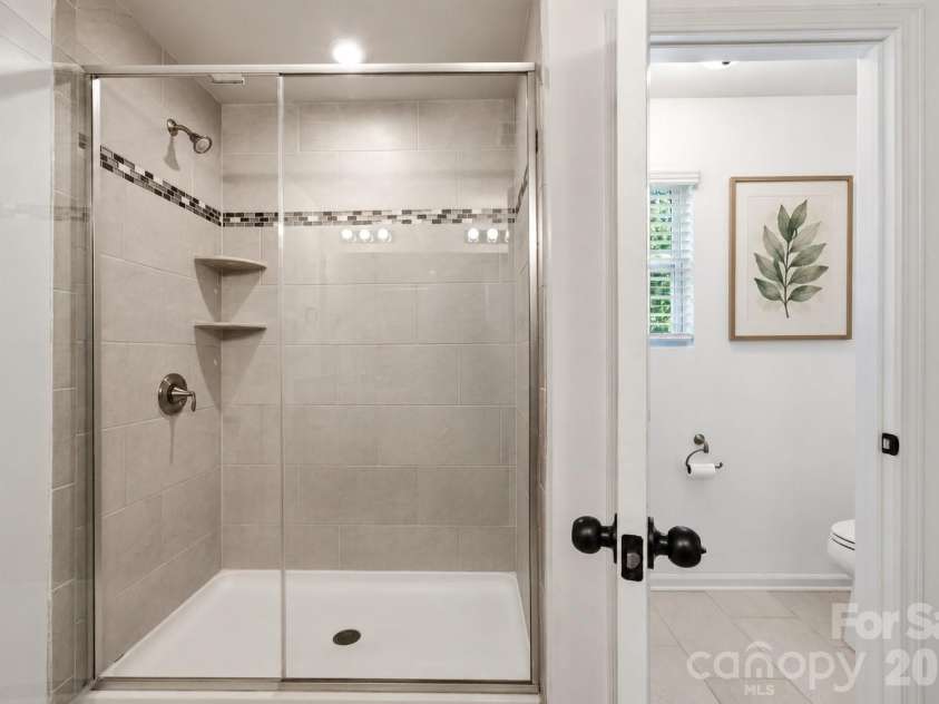 1613 Calder Drive, Indian Trail, NC 28079.  MLS# CAR4397830, YatesRealty ID 33088. Primary bath walk-in shower