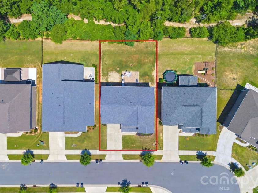 1613 Calder Drive, Indian Trail, NC 28079.  MLS# CAR4397830, YatesRealty ID 33088. Tree-lined views for backyard