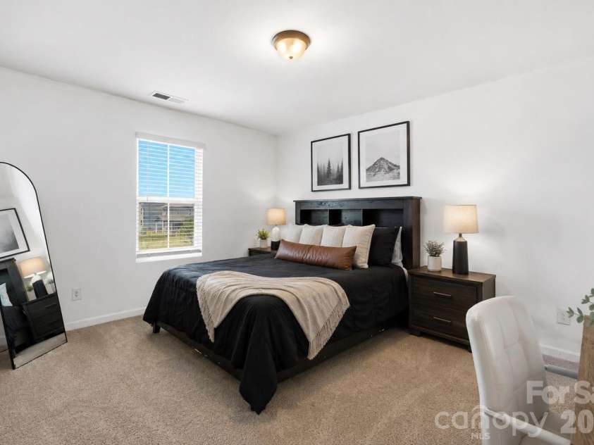 1613 Calder Drive, Indian Trail, NC 28079.  MLS# CAR4397830, YatesRealty ID 33088. Upper level guest bedroom