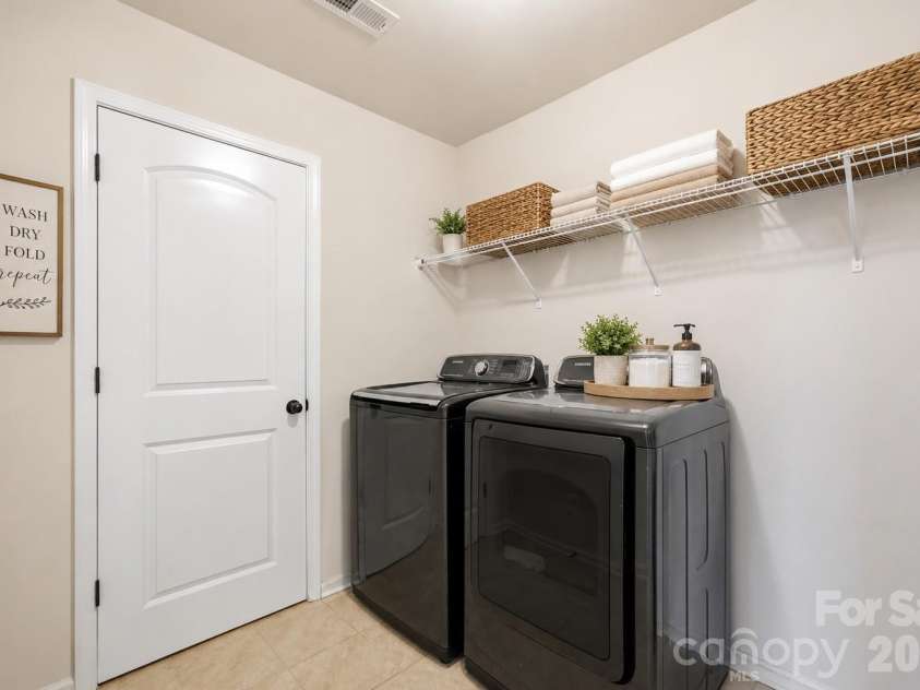 1613 Calder Drive, Indian Trail, NC 28079.  MLS# CAR4397830, YatesRealty ID 33088. Upper level laundry room