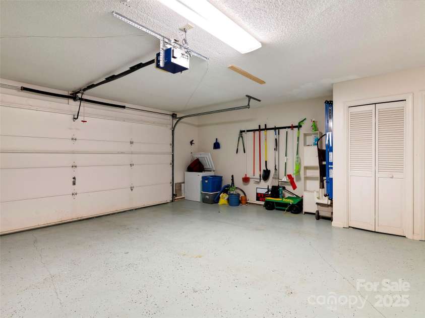 25 Cedarcliff Circle, Asheville, NC 28803.  MLS# CAR4291336, YatesRealty ID 33090. A dream garage with plenty of storage