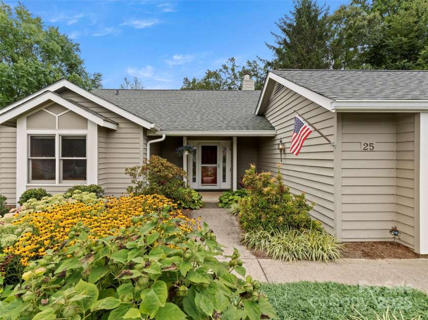 25 Cedarcliff Circle, Asheville, NC 28803.  MLS# CAR4291336, YatesRealty ID 33090. Beautiful, mature landscaping surrounds this home