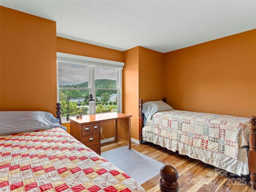 25 Cedarcliff Circle, Asheville, NC 28803.  MLS# CAR4291336, YatesRealty ID 33090. Spacious guests bedroom