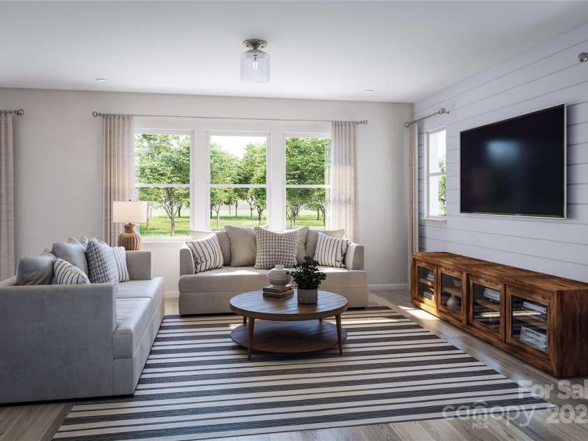 7019 Short Stirrup Lane, Mint Hill, NC 28227.  MLS# CAR4291691, YatesRealty ID 33094. Open-concept living area imagined with abundant natural light.