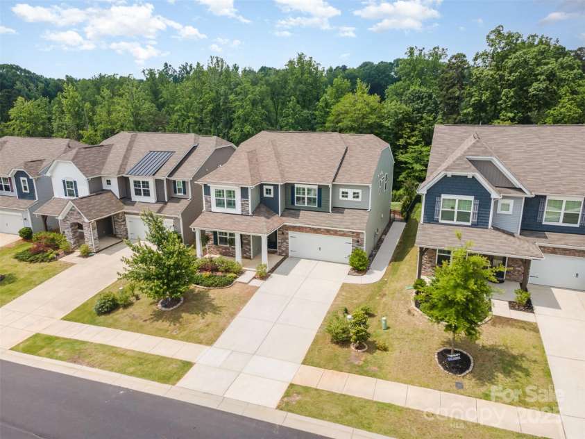 150 Haddonsfield Drive, Mooresville, NC 28115.  MLS# CAR4266211, YatesRealty ID 33097. Ideal location across from common area and trees in the back!