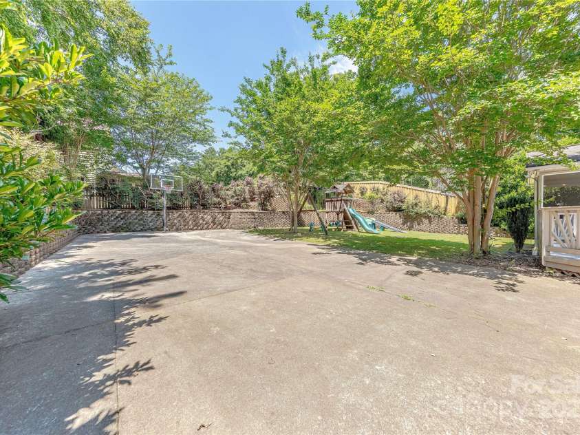 2836 Providence Spring Lane, Charlotte, NC 28270.  MLS# CAR4278726, YatesRealty ID 33101. Paved Sports Court