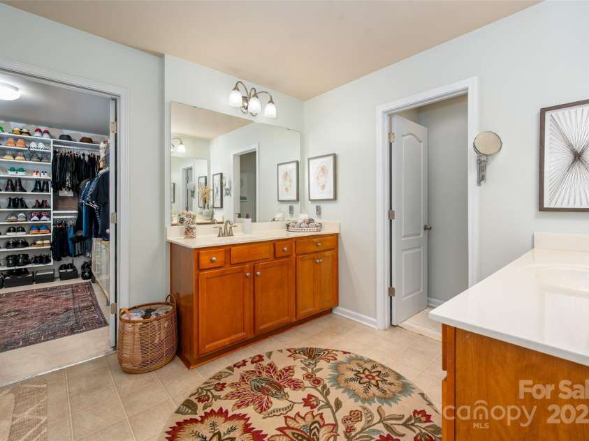 8909 Savannah Road, Harrisburg, NC 28075.  MLS# CAR4269796, YatesRealty ID 33109. Dual vanities.