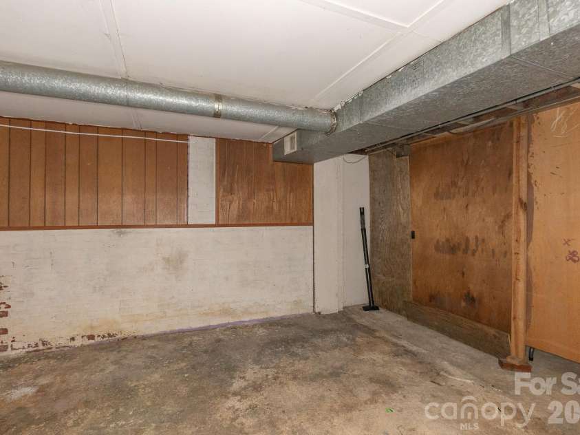 46 Gilkey Street, Marion, NC 28752.  MLS# CAR4396879, YatesRealty ID 33112. Heated basement area