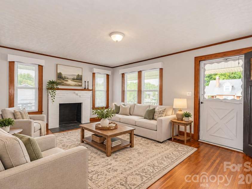 46 Gilkey Street, Marion, NC 28752.  MLS# CAR4396879, YatesRealty ID 33112. Staged with AI