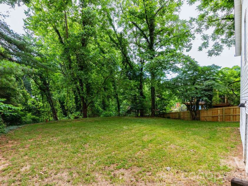 129 Shelburne Road, Asheville, NC 28806.  MLS# CAR4397119, YatesRealty ID 33114. Another view of backyard