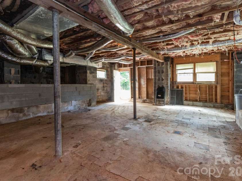 129 Shelburne Road, Asheville, NC 28806.  MLS# CAR4397119, YatesRealty ID 33114. Second view of basement