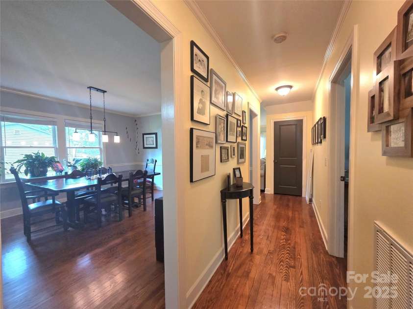 4065 Mountainview Street, Gastonia, NC 28056.  MLS# CAR4290116, YatesRealty ID 33115. Hallway from bathroom on main BRs on the right