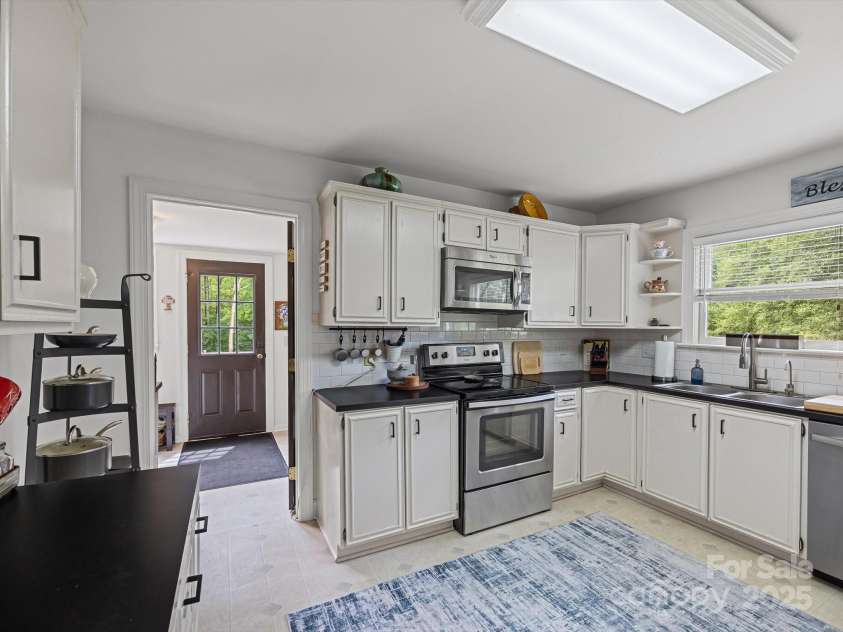 4065 Mountainview Street, Gastonia, NC 28056.  MLS# CAR4290116, YatesRealty ID 33115. Newer appliances, laundry room off the kitchen.