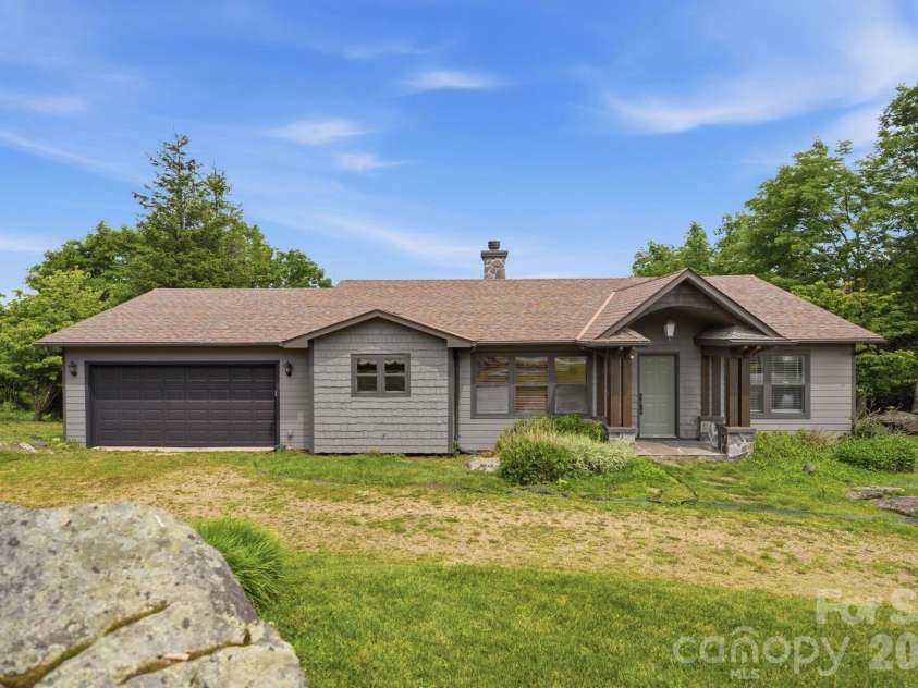 276 Four Diamond Drive, Seven Devils, NC 28604.  MLS# CAR4394348, YatesRealty ID 33119. Natural boulders surround the property
