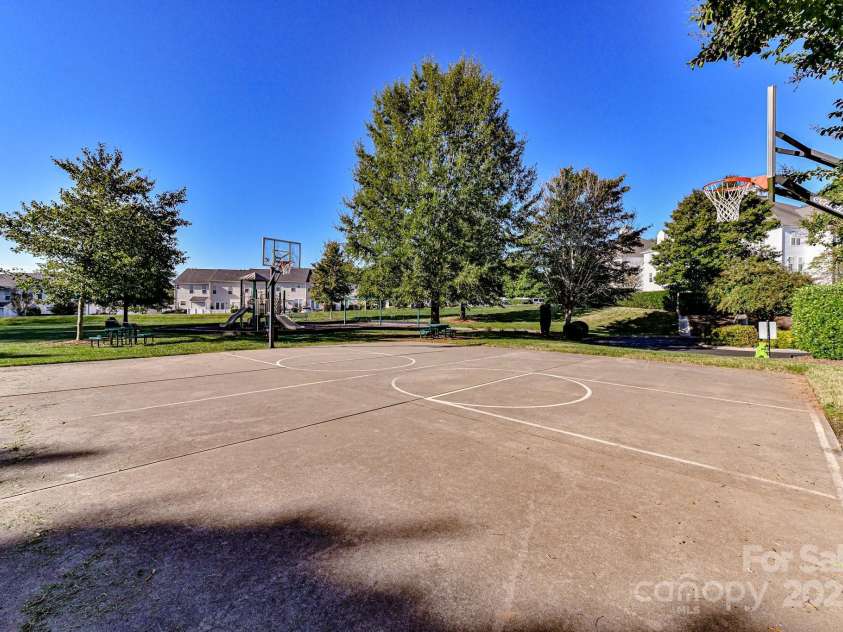 9724 Cadman Court, Cornelius, NC 28031.  MLS# CAR4233696, YatesRealty ID 3312. Community Basketball Court!