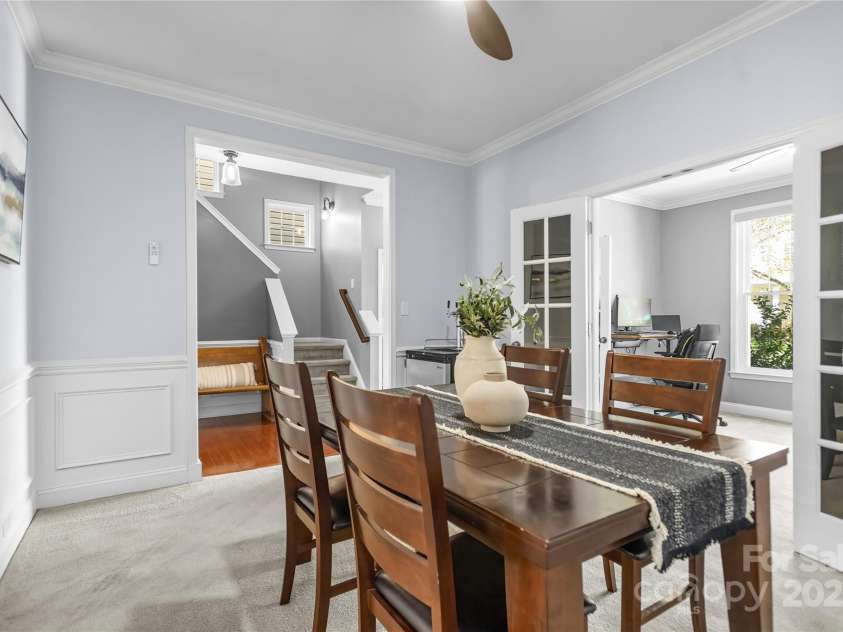 9724 Cadman Court, Cornelius, NC 28031.  MLS# CAR4233696, YatesRealty ID 3312. Formal Dining Room with wainscoting, crown molding & French doors to Office!