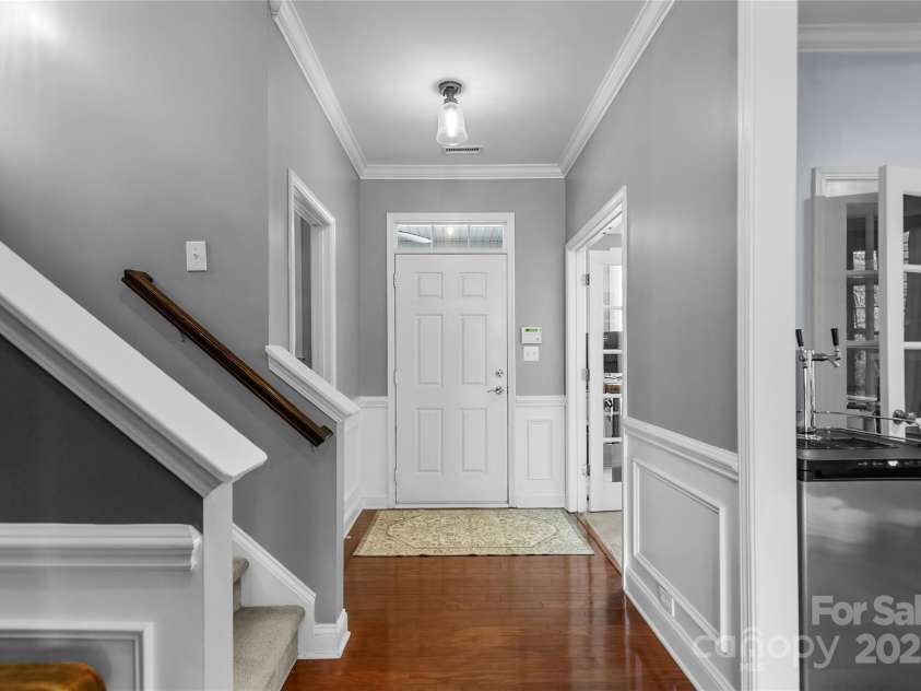 9724 Cadman Court, Cornelius, NC 28031.  MLS# CAR4233696, YatesRealty ID 3312. Foyer Entry with crown molding!