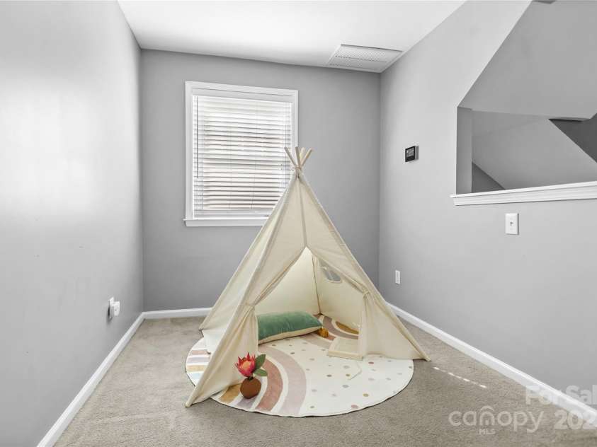 9724 Cadman Court, Cornelius, NC 28031.  MLS# CAR4233696, YatesRealty ID 3312. Loft!